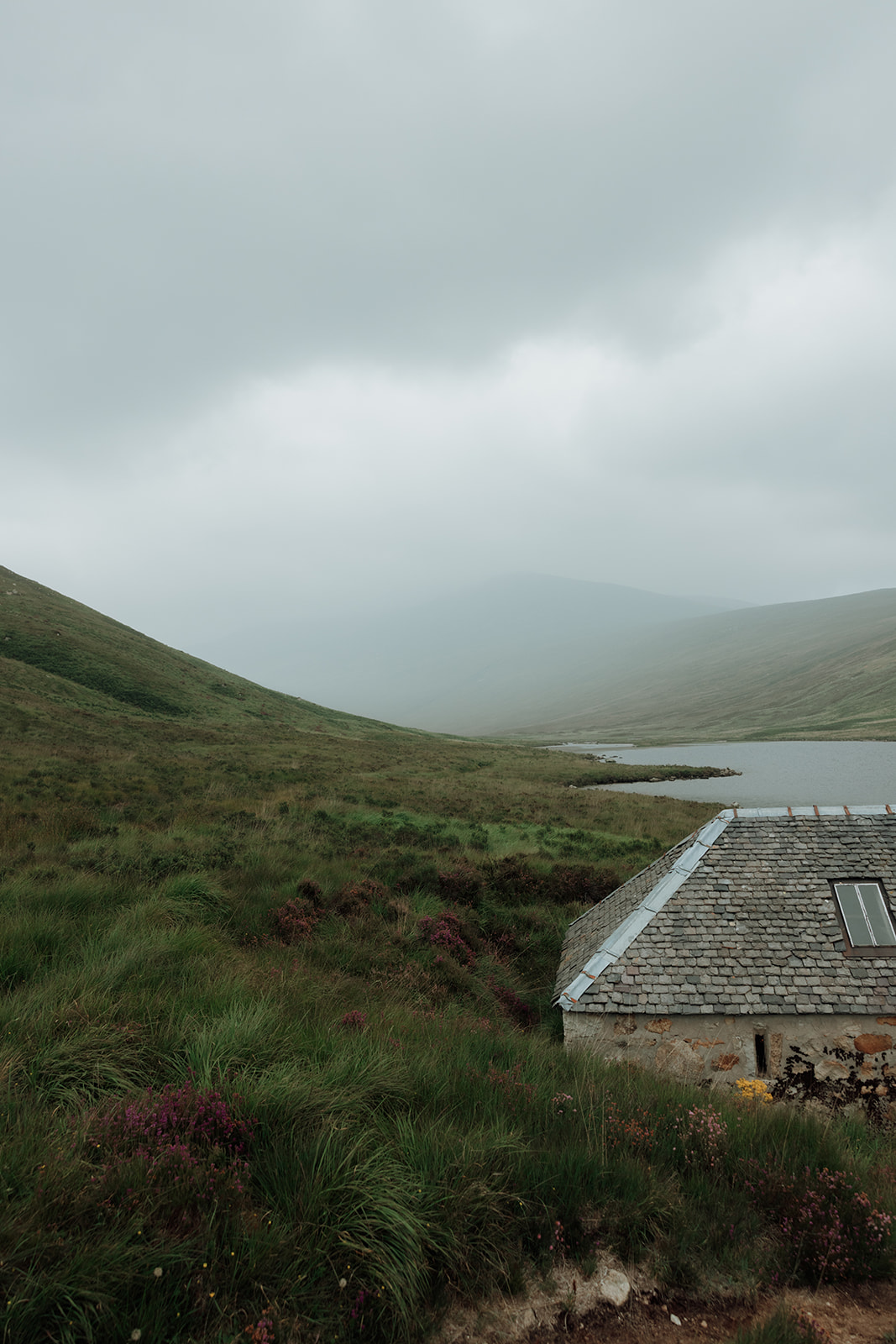 Loch Iorsa with surrounding green hills on Isle of Arran.